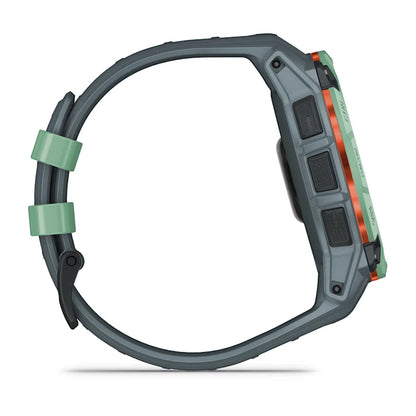 Montre GPS Garmin Instinct 3 AMOLED - 50 mm Vert d'eau avec bracelet bleu crépuscule