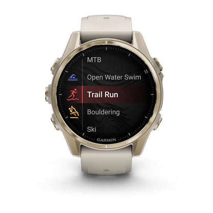 Montre GPS Garmin Fénix 8 AMOLED - 43 mm Sapphire Titane Soft Gold avec Bracelet en Silicone Gris Beige